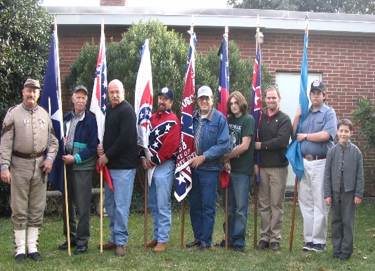 The Delaware Gray color guard lines up at the camp's  second annual Christmas party.